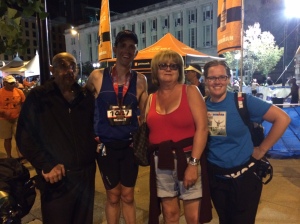 My dad, My mom, and my girlfriend at the end of the Ironman. 